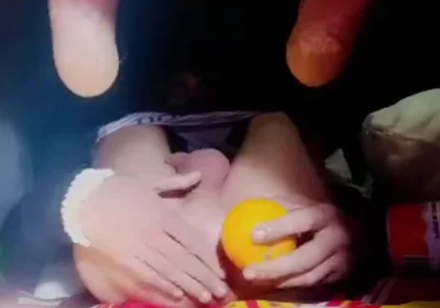 A Young Man Stuffs a Crystal Ball and an Orange up His Tight Ass.