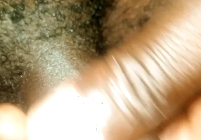Masturbating