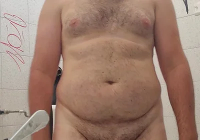 Completely Naked in a Station Bathroom