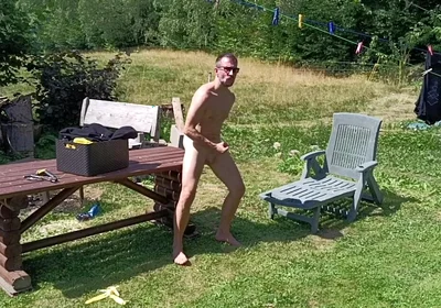 Jerking off While Hanging Out the Laundry