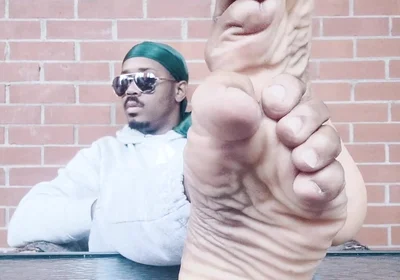 I Expose My Feet and I Touch Them