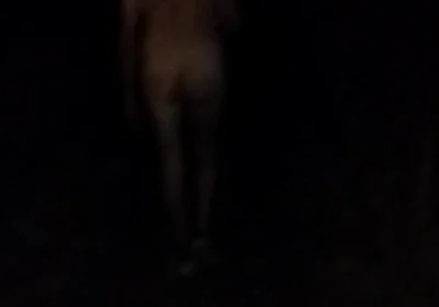 Naked Walking on the Hill Along Highway