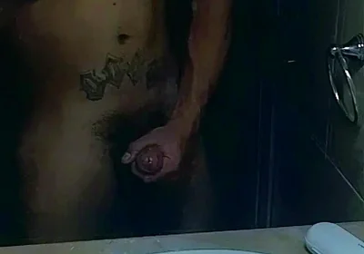Masturbating
