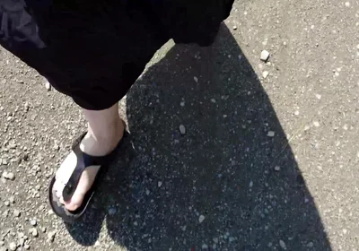 Outdoor in a Black Caftan and Barefoot in Black Birkenstocks