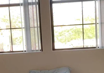 Watching Him Drift Between Shirts and Shorts