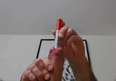Sounding an Eding Pen While Stretching My Testicles