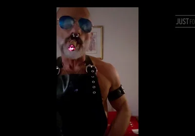 Stepdad lighting his Cigar in rubber apron
