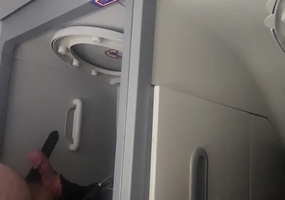 Airplane Bathroom Jerk and Cum.