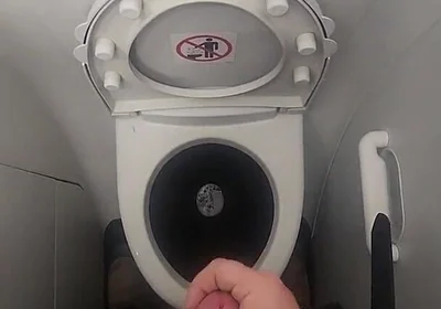 Airplane Bathroom Jerk and Cum.