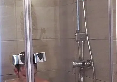 After a Full Day on the Road Wet Solo in the Hotel Shower