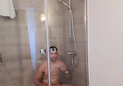 After a Full Day on the Road Wet Solo in the Hotel Shower