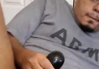 Browndicksavior Using His Oral Sex Toy and Stroking His Brown Cock