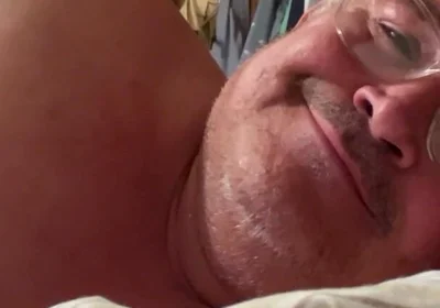 Man Lying in Bed