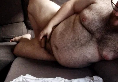Fat Hairy Jerks off While Watching Porn