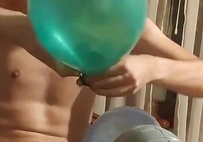 Blowing up Party Balloons on My Aqua Blue Inflatable Unicorn