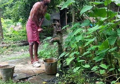 Tha naked Indian mature man shower in open place and showing body and dick..