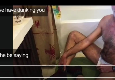 Guy Getting Dunked in a Tub.
