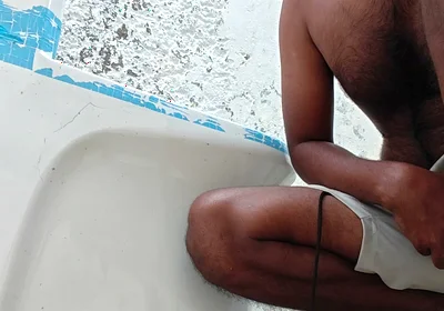Washing the Bathroom in Xhard Village