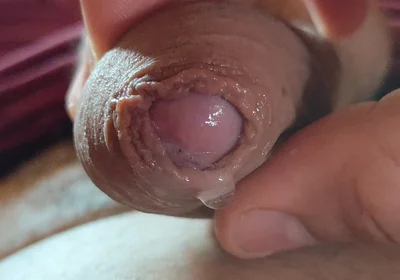 Close-up of Glans Ejaculating Intensely Before Cumming.