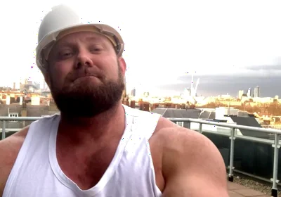 Builder Iron Bending Muscle Flexing and Measuring