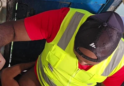 Construction Site Bathroom and Workers