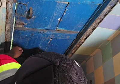 Two Construction Workers Making Out in the Company Bathroom.