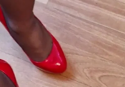 Walking in High Red Heels