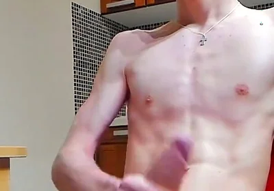 A young beautiful gay twink fucks a vibrator