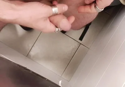 Jerking off a Cock in a Public Toilet