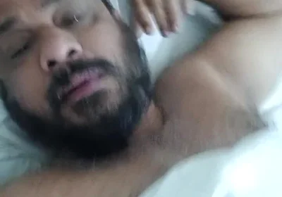 Indian Daddy Lying on the Bed Teasing and Posing for You